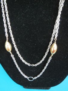 silver color chain with gold color beads